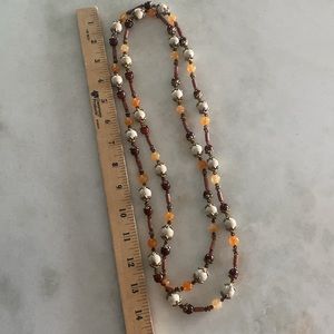 Brown, white, and peach beads necklace